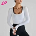 The tight-fitting long-sleeved shirt hugs the body, providing a smooth and flattering fit. Ideal for layering or wearing alone, it combines comfort with a stylish silhouette.
