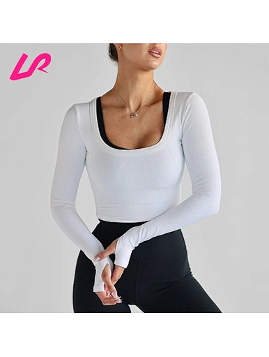 The tight-fitting long-sleeved shirt hugs the body, providing a smooth and flattering fit. Ideal for layering or wearing alone, it combines comfort with a stylish silhouette.